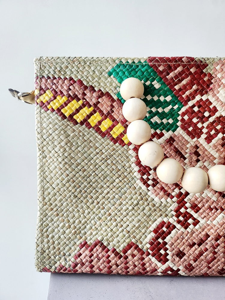 The Handwoven Amparo Bag displayed in a lifestyle setting, perfect for those seeking a sustainable, stylish accessory that supports local artisans